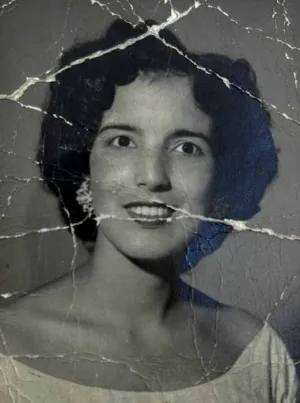 Damaged portrait before restoration